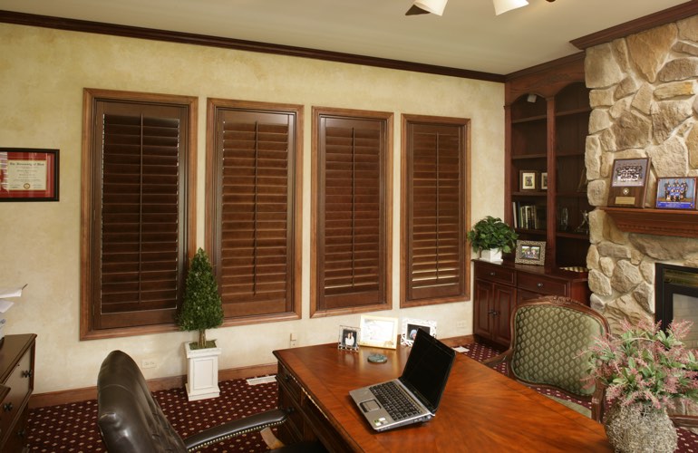 Wooden plantation shutters in a Sacramento home office